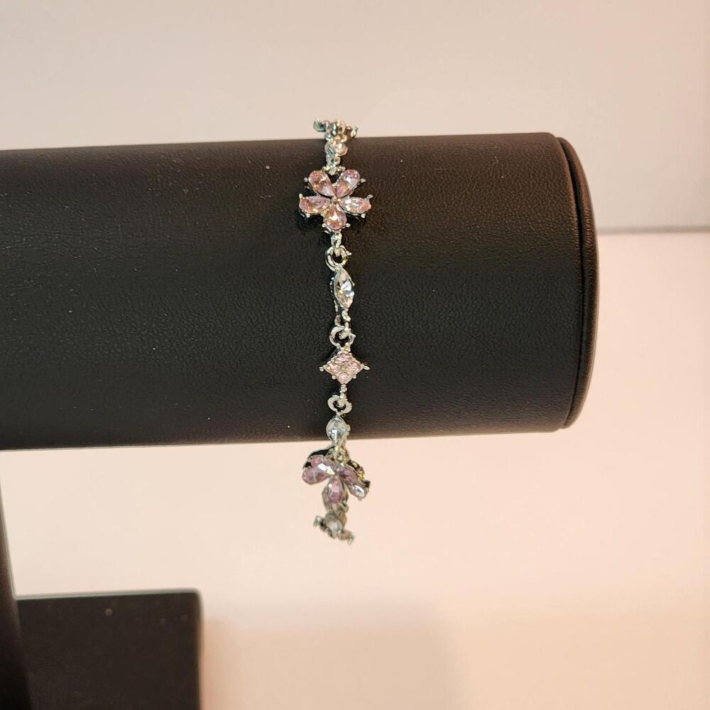 Floral pink and clear rhinestone bracelet with silver tone accents